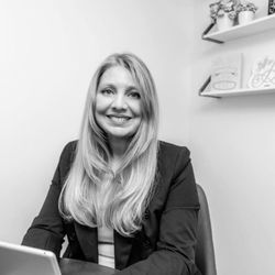 Shara Grachek - Five Star Real Estate - Shara working at Holt office.