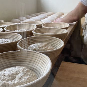 Zu Bakery - a baker making a batch of bread - Bakeries Near Me - Portland, Maine