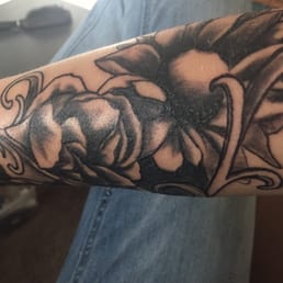 Go to Junkyard Ink and talk to Dray! I am so happy with my new tattoo!!!