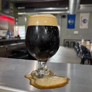 Afterburner Brewing Company - a glass of beer on a table - Beer Bar Near Me - Terre Haute, Indiana Afterburner Brewing Company - a glass of beer on a table - Beer Bar Near Me - Terre Haute, Indiana