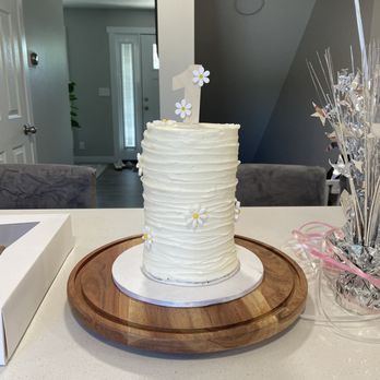 Sugar Sweets SLC - a white cake on a table - Desserts Near Me