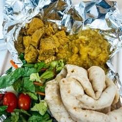 Shirley’s Trini Cuisine - Curry Chicken, Channa & Aloo (chickpeas & potatoes), and Dhalpuri Roti