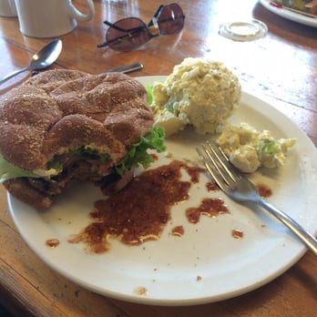 Glacier Highland - Huckleberry Hound burger with potato salad. - Resorts Near Me - West Glacier, Montana Glacier Highland - Huckleberry Hound burger with potato salad. - Resorts Near Me - West Glacier, Montana