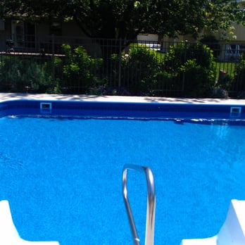Neptune Pools - Here is a picture of my pool full of water after the new liner was installed in the spring of 2013. Neptune Pools built the pool - Swimming Pools Near Me - Joliet, Illinois