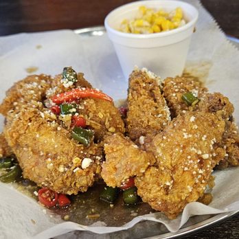 A Tacoria - Hot soy garlic wings with a side of elote - Tacos Near Me - Suwanee, Georgia A Tacoria - Hot soy garlic wings with a side of elote - Tacos Near Me - Suwanee, Georgia