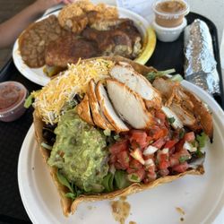 Charo Chicken - Papa charo plate in back and chicken Spicy Tostada Salad