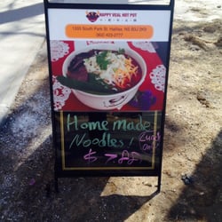 Happy Veal Hot Pot - Sandwich board advertising the lunch special.
