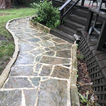 Innovation Landscaping - a stone path leading to a house - Irrigation Near Me Innovation Landscaping - a stone path leading to a house - Irrigation Near Me