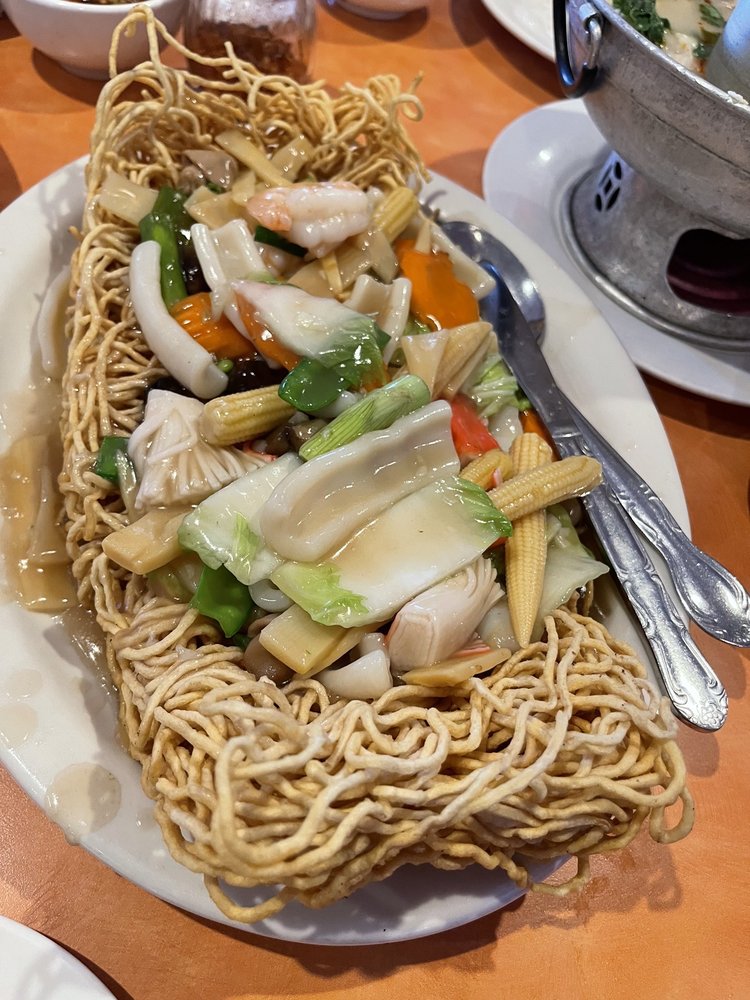 Special fried chow Mein noodles with seafood gravy. Yelp