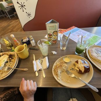 Snooze, an A.M. Eatery - Spuds deluxe/ sandwich I am / single chocolate chip pancake - Breakfast & Brunch Near Me - San Antonio, Texas Snooze, an A.M. Eatery - Spuds deluxe/ sandwich I am / single chocolate chip pancake - Breakfast & Brunch Near Me - San Antonio, Texas