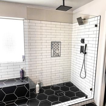 Austin Shower Glass - Stylish walk-in shower with black hex tile flooring, frameless glass, and matte black fixtures in Austin, TX. - Glass & Mirrors Near Me - Bee Cave, Texas Austin Shower Glass - Stylish walk-in shower with black hex tile flooring, frameless glass, and matte black fixtures in Austin, TX. - Glass & Mirrors Near Me - Bee Cave, Texas