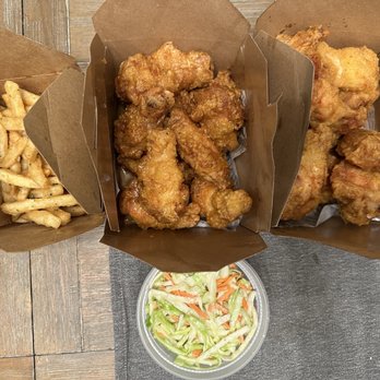Lee's Korean Kitchen - From top left - French Fries Provenzal, Soy Garlic Chicken Wings, Original Chicken Wings and Coleslaw - Korean Near Me - Port Washington, New York Lee's Korean Kitchen - From top left - French Fries Provenzal, Soy Garlic Chicken Wings, Original Chicken Wings and Coleslaw - Korean Near Me - Port Washington, New York