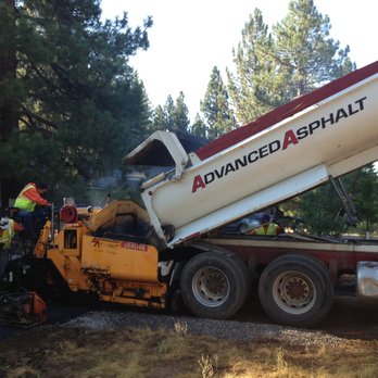 Advanced Asphalt - a dump truck dumping asphalt - Masonry/Concrete Near Me - Truckee, California