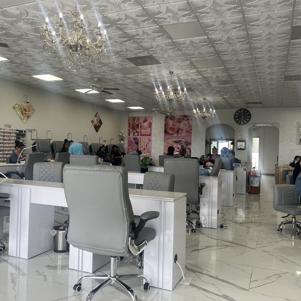 Lisa's Nail & Spa - Inside. Chandeliers on the ceiling and marble tile. They have pedicure stations on the sides and nail stations in the center. - Nail Salons Near Me - Fresno, California Lisa's Nail & Spa - Inside. Chandeliers on the ceiling and marble tile. They have pedicure stations on the sides and nail stations in the center. - Nail Salons Near Me - Fresno, California
