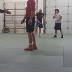 The Base Longview - My son getting instructed