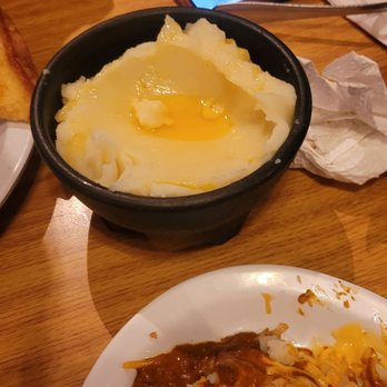 Wild Bill's Grill - a plate of mashed potatoes, gravy, and a bowl of gravy - Burgers Near Me - Woodville, Texas Wild Bill's Grill - a plate of mashed potatoes, gravy, and a bowl of gravy - Burgers Near Me - Woodville, Texas