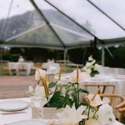 a table set for a wedding reception a table set for a wedding reception