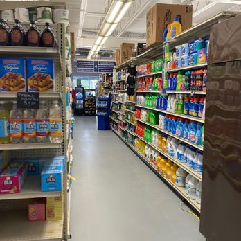 Maritime Market - a refrigerator and shelves in a grocery store - Grocery Near Me - Bald Head Island, North Carolina