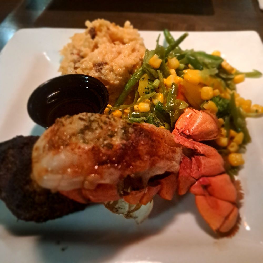 Keegan's Grill - Maine lobster and petit filet with cheesy potatoes and veggies - American Near Me - Phoenix, Arizona Keegan's Grill - Maine lobster and petit filet with cheesy potatoes and veggies - American Near Me - Phoenix, Arizona