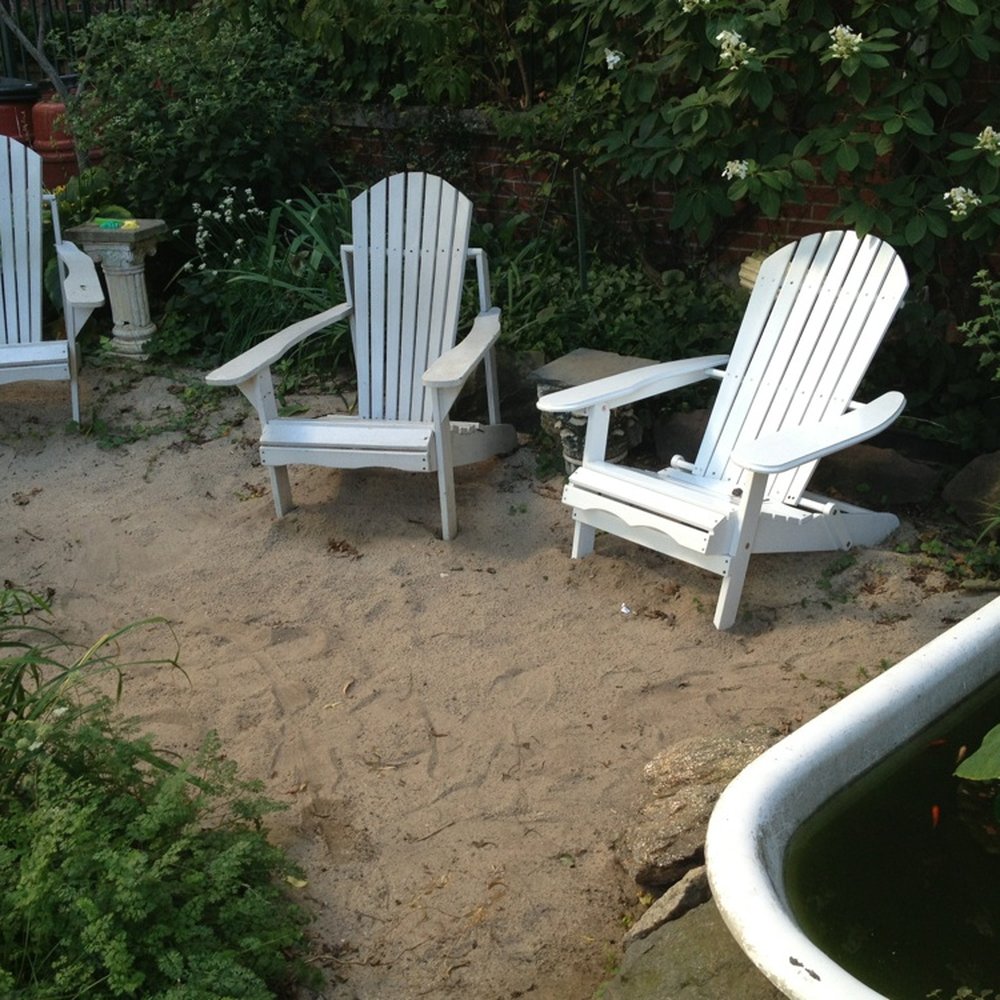 Oasis Community Garden - Sandy beach for your feet and a bathtub with fish - Community Gardens Near Me - New York, New York Oasis Community Garden - Sandy beach for your feet and a bathtub with fish - Community Gardens Near Me - New York, New York