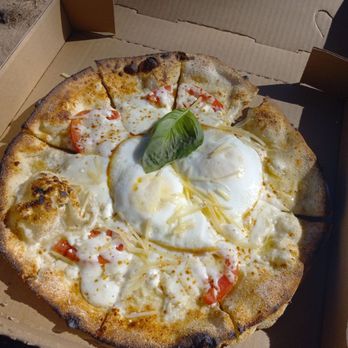 Blue Rooster Produce - Their delicious pizza! White pizza with eggs. - Farmers Market Near Me - Peoria, Arizona