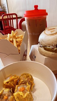 Photo of Bun Bun Bao - Cerritos, CA, US. Chicken Bun Bun Bao, Siu Mai, Iced Hong Kong Milk Tea, and Fries (TikTok: @justandyvu)