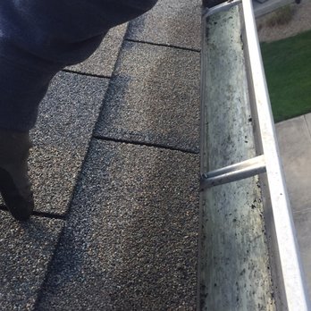 Hitzeman’s Gutter And Window Care - We wipe every gutter on the insides with a towel after removing granules and debris - Gutter Services Near Me