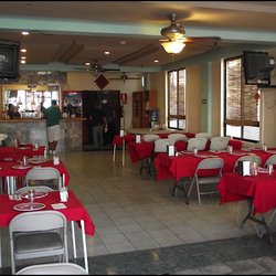 China-Loa - I'd say the dining room is quite retro, but spacious and comfortable, if you don't mind folding chairs.
