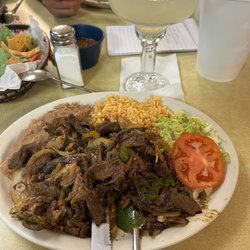 San Juan Restaurants Taqueria 2 - Beef fajita plate and margarita on the rocks