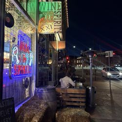 Amendment XXI Wine & Spirits - Front of the shop at night