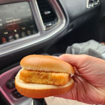 McDonald's - a hand holding a chicken sandwich - Fast Food Near Me - Randolph, Vermont