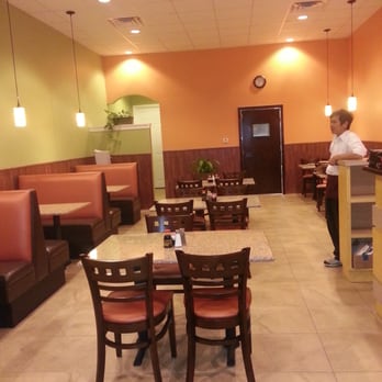 Hunan Jade - Hunan owner talking to my husband. - Chinese Near Me - Spring, Texas