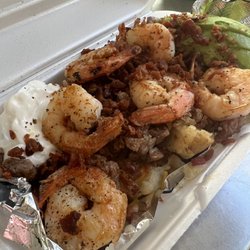 Hibachi time on wheels - Loaded potatoes with asada and shrimp comes with sour cream avocado butter chives and bacon