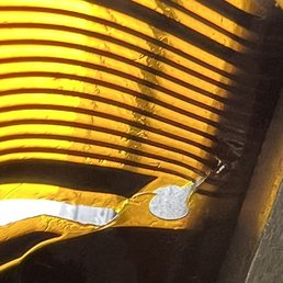 Torn flex cable prior to repair Torn flex cable prior to repair