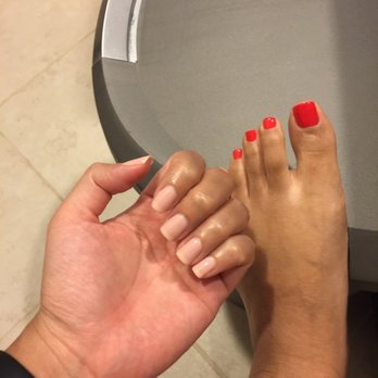 My Spa Lounge - OPI Cajun Shrimp on my toes and I'm not sure what is on my fingers but it's also by OPI - Nail Salons Near Me - Houston, Texas