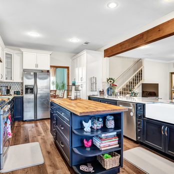 Fire & Water Restoration Plus - Opening of wall from kitchen to living and installation / redesign of all wood cabinets with quartz and butcherblock countertops. - Damage Restoration Near Me - Wylie, Texas