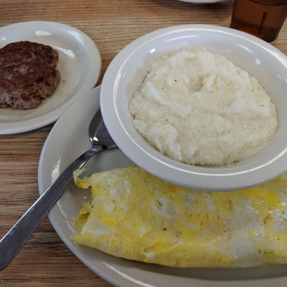 Bullshippers Cafe - Mushroom omelet with grits and sausage patty - Diners Near Me - Logansport, Indiana