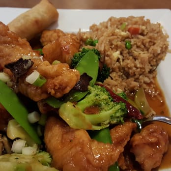 Soaring Dragon - Yummy tangerine chicken comes with a soup and eggroll or spring roll! I asked for extra veggies.. - Chinese Near Me - Kerrville, Texas Soaring Dragon - Yummy tangerine chicken comes with a soup and eggroll or spring roll! I asked for extra veggies.. - Chinese Near Me - Kerrville, Texas