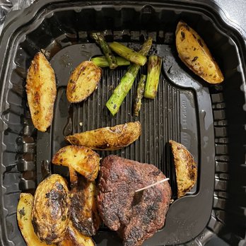 J Gilbert's - This was my filet and side of potatoes and asparagus that was delivered. - Steakhouses Near Me - McLean, Virginia