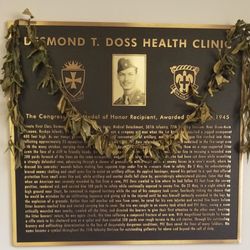 Desmond T. Doss Health Clinic - Plaque about the man behind the name.