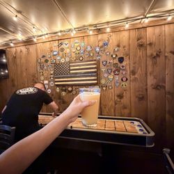 Rogue Brew Pub & Eatery - Super cool patch wall and shuffle board