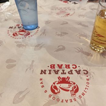 Captain Crab - Table covered with paper for the mess. - Seafood Near Me - Sacramento, California Captain Crab - Table covered with paper for the mess. - Seafood Near Me - Sacramento, California