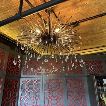 Boca - a chandelier hanging from the ceiling in a restaurant - Moroccan Near Me - Hickory, North Carolina Boca - a chandelier hanging from the ceiling in a restaurant - Moroccan Near Me - Hickory, North Carolina