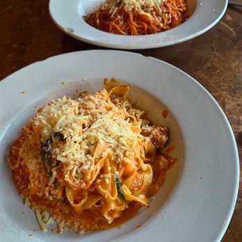 Trattoria Stella - Tomato Vodka Cream In front. Spaghetti Arrabbiata in back. - Italian Near Me - Denver, Colorado Trattoria Stella - Tomato Vodka Cream In front. Spaghetti Arrabbiata in back. - Italian Near Me - Denver, Colorado