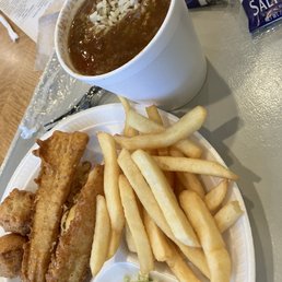 a plate of food and a cup of soup