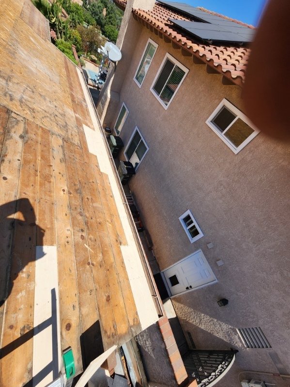 Slide of MMM Roofing