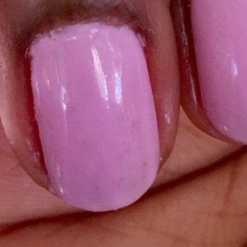 Organic Nails Spa - This is the final product of one of my nails. If you get shellac often, you know that these specs & areas of discoloration are not normal. - Nail Salons Near Me - Austin, Texas