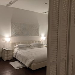 Hotel Magna Pars Suites - Master bed room with King sized bed
