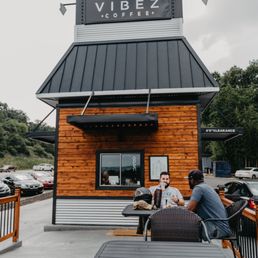 Exterior outside entrance of Vibez Coffee - Patio hangs. - Cleveland, Tennessee Exterior outside entrance of Vibez Coffee - Patio hangs. - Cleveland, Tennessee