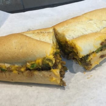 Steak Escape Southridge Mall - a sub sandwich cut in half - Cheesesteaks Near Me - Greendale, Wisconsin Steak Escape Southridge Mall - a sub sandwich cut in half - Cheesesteaks Near Me - Greendale, Wisconsin